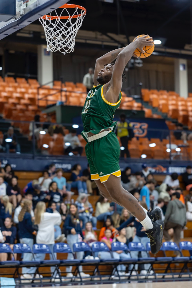 Tim Adetukasi going for the dunk